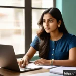 Home 20 IT 이직을 준비하는 정보처리 자격증 활용 전략 - A young Indian woman in casual professional attire sitting at a modern desk, attentively learning fr...